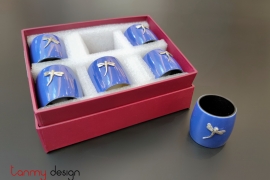 Set of 6 dark blue napkin rings attached with dragonfly